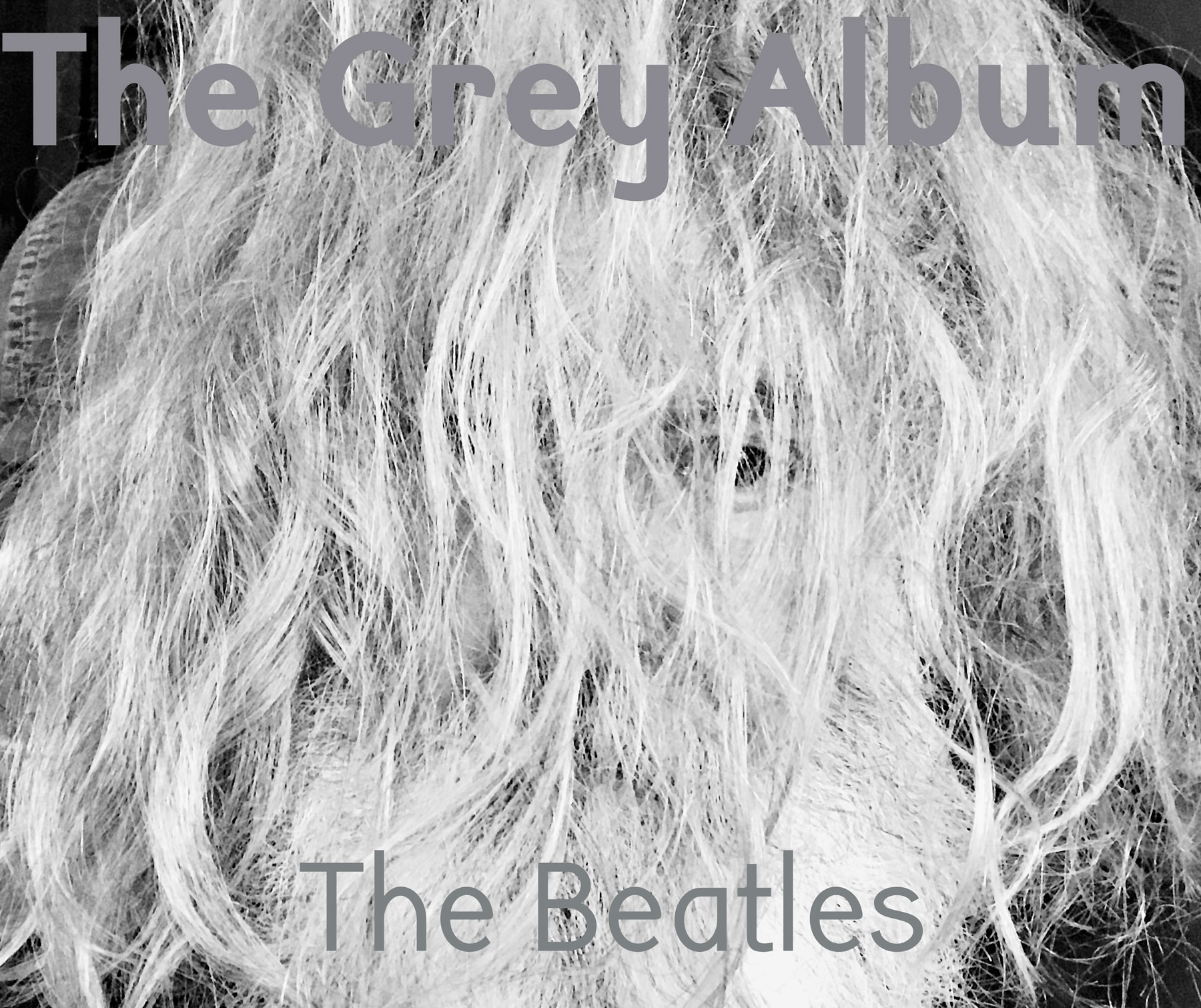 Greyscale image of very hairy man, with long white hear and white beard. A large bold grey title at the top ‘The Grey Album’, then in thinner typography at the bottom ‘The Beatles’